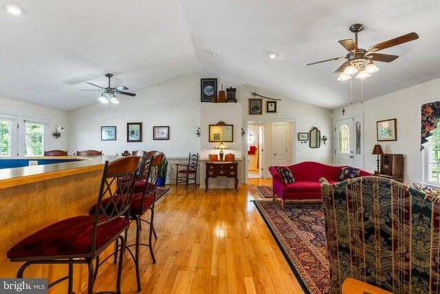 15103 Jenkins Hill Ln, Culpeper, VA 22701 - living room with ceiling fan, vaulted ceiling, and light wood-style flooring
