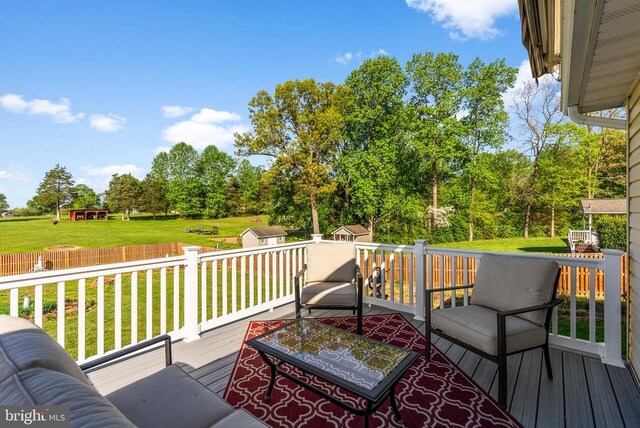 15103 Jenkins Hill Ln, Culpeper, VA 22701 - wooden deck featuring a lawn, view of wooded area, and an outdoor hangout area