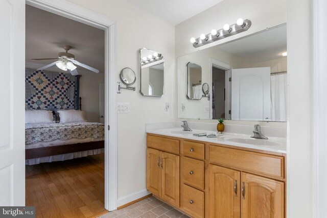 15103 Jenkins Hill Ln, Culpeper, VA 22701 - bathroom with connected bathroom, ceiling fan, double vanity, and baseboards