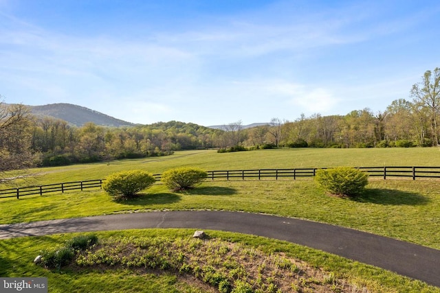  - view of yard featuring a mountain view and a view of countryside