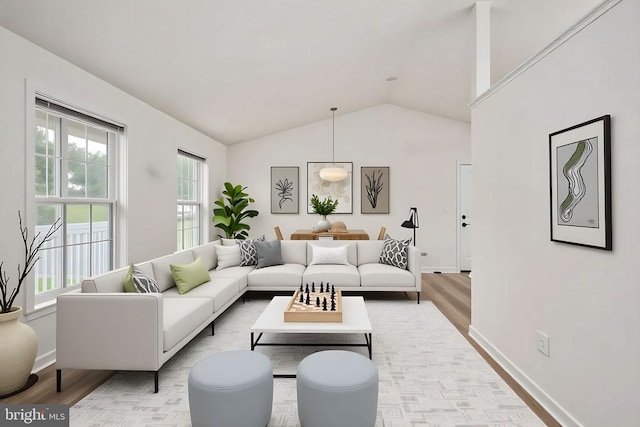 11810 Falcon Ridge Dr, Fredericksburg, VA 22407 - living room with vaulted ceiling, light wood-type flooring, and baseboards