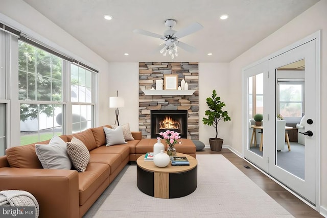 11810 Falcon Ridge Dr, Fredericksburg, VA 22407 - living area featuring healthy amount of natural light, wood finished floors, a ceiling fan, recessed lighting, and a fireplace