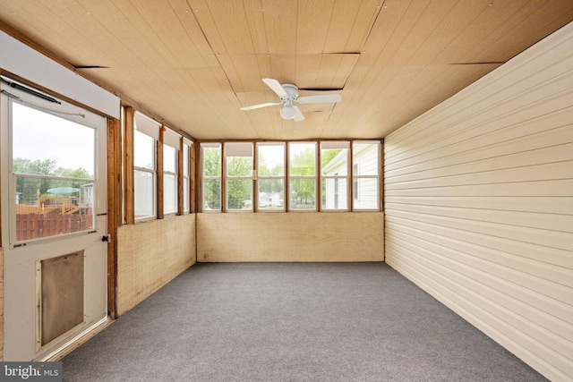 11810 Falcon Ridge Dr, Fredericksburg, VA 22407 - unfurnished sunroom with wooden ceiling, a ceiling fan, wood walls, and carpet