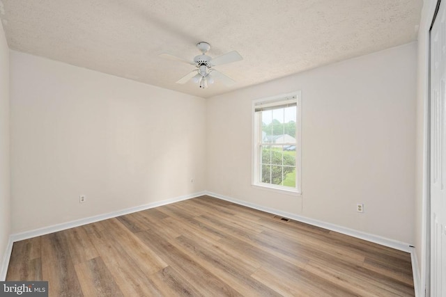 11810 Falcon Ridge Dr, Fredericksburg, VA 22407 - unfurnished room featuring wood finished floors, baseboards, a textured ceiling, and ceiling fan