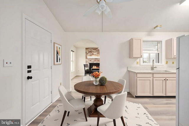 11810 Falcon Ridge Dr, Fredericksburg, VA 22407 - dining space featuring light wood-style floors, ceiling fan, and healthy amount of natural light