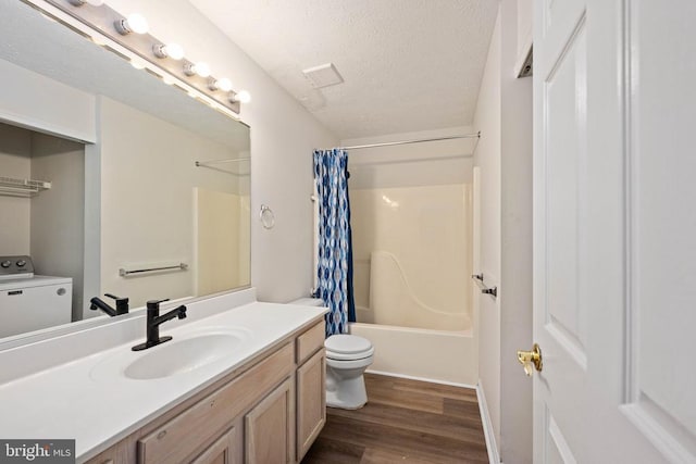 11810 Falcon Ridge Dr, Fredericksburg, VA 22407 - bathroom with toilet, washer / clothes dryer, vanity, wood finished floors, and shower / bath combo