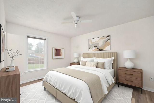 11810 Falcon Ridge Dr, Fredericksburg, VA 22407 - bedroom with light wood-style flooring, baseboards, and ceiling fan