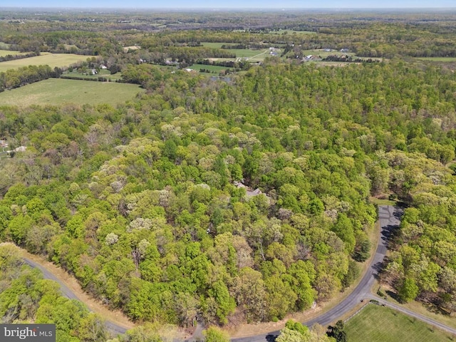  - aerial view featuring a forest view