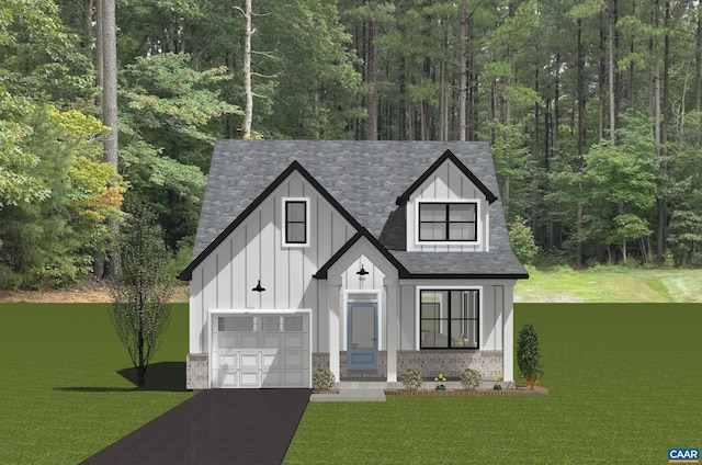 28A Fowler St, Charlottesville, VA 22911 - modern farmhouse with board and batten siding, a front yard, asphalt driveway, and an attached garage