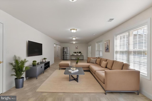 11918 Boulder Ct, Spotsylvania, VA 22553 - living area with light wood-style flooring and baseboards