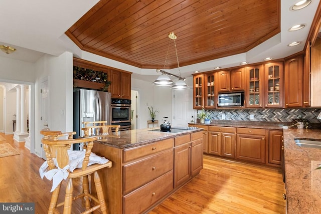 11918 Boulder Ct, Spotsylvania, VA 22553 - kitchen with stainless steel appliances, a tray ceiling, a kitchen island, dark stone counters, and wooden ceiling