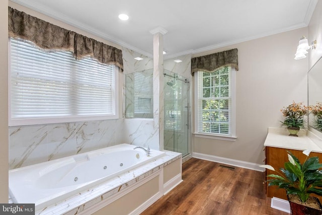 11918 Boulder Ct, Spotsylvania, VA 22553 - bathroom with a marble finish shower, a tub with jets, ornamental molding, vanity, and wood finished floors