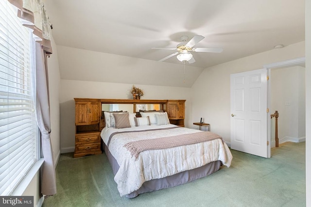 11918 Boulder Ct, Spotsylvania, VA 22553 - bedroom featuring light colored carpet, multiple windows, vaulted ceiling, and ceiling fan