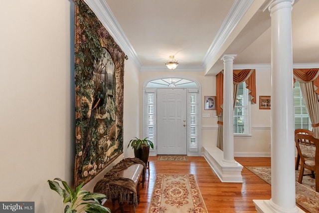 11918 Boulder Ct, Spotsylvania, VA 22553 - entryway featuring ornate columns, ornamental molding, and wood finished floors