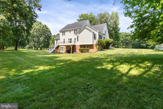 11918 Boulder Ct, Spotsylvania, VA 22553 - back of property featuring stairway, a yard, and a deck