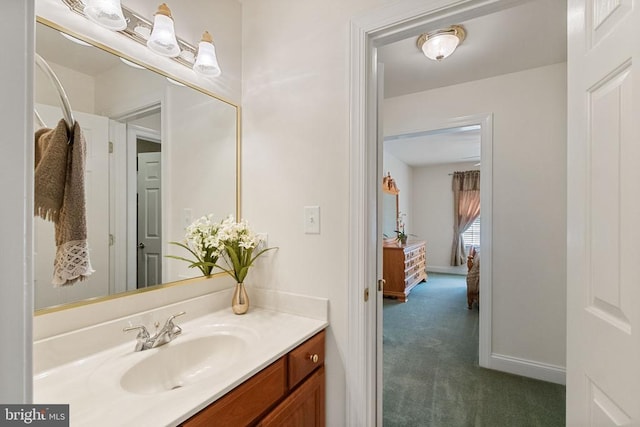 11918 Boulder Ct, Spotsylvania, VA 22553 - bathroom featuring vanity and baseboards
