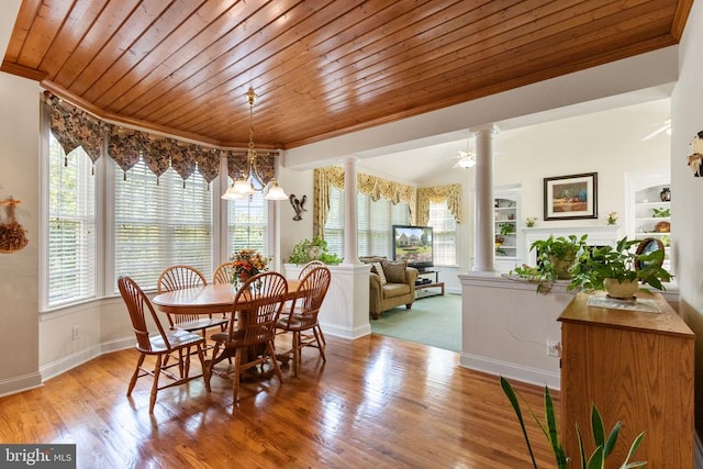11918 Boulder Ct, Spotsylvania, VA 22553 - dining room with ornate columns, crown molding, wooden ceiling, wood finished floors, and built in features