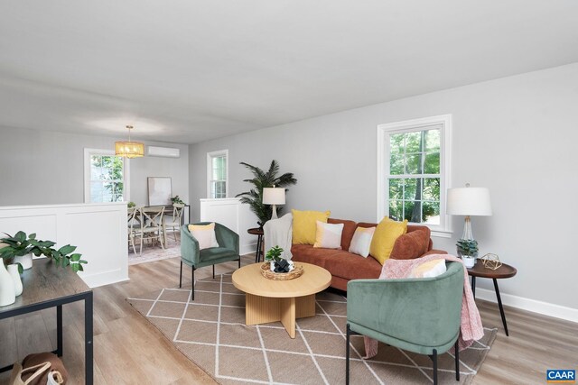 1601 Antoinette Ave, Charlottesville, VA 22903 - living room featuring light wood-style floors and healthy amount of natural light