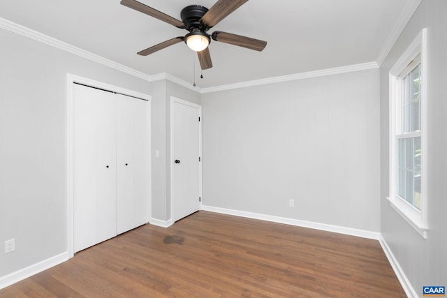 1601 Antoinette Ave, Charlottesville, VA 22903 - unfurnished bedroom with wood finished floors, ornamental molding, ceiling fan, and a closet