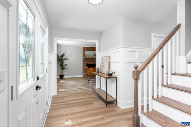 1601 Antoinette Ave, Charlottesville, VA 22903 - entrance foyer with plenty of natural light, stairway, and light wood-type flooring