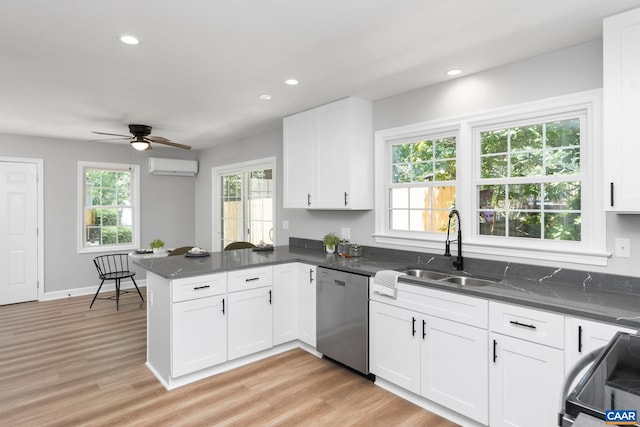 1601 Antoinette Ave, Charlottesville, VA 22903 - kitchen featuring dishwasher, an AC wall unit, a peninsula, white cabinetry, and ceiling fan