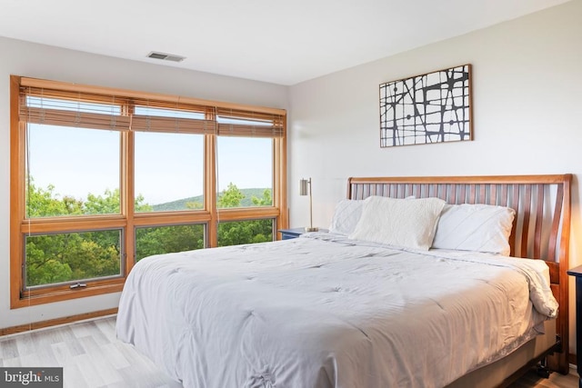 1545 Cliffs, Roseland, VA 22967 - bedroom featuring wood finished floors and baseboards