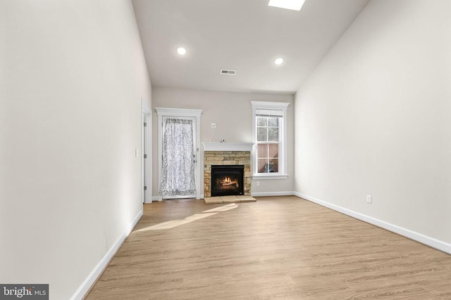 5711 Finley Rose Ct, Fredericksburg, VA 22407 - unfurnished living room with wood finished floors, a fireplace, and recessed lighting