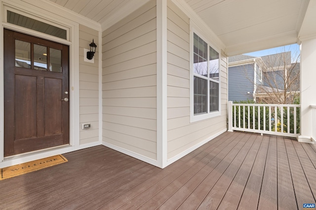 doorway to property featuring a porch