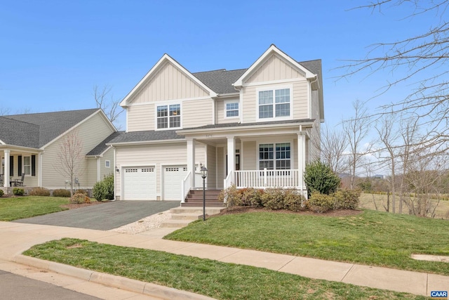 view of front of house featuring board and batten siding, an attached garage, a porch, aphalt driveway, and a front lawn