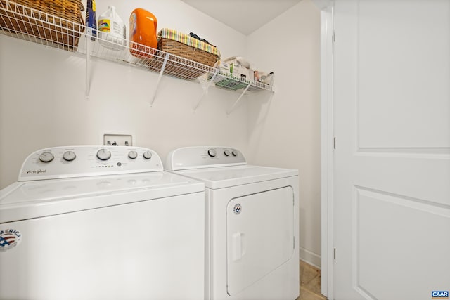 laundry area with washing machine and dryer and laundry area