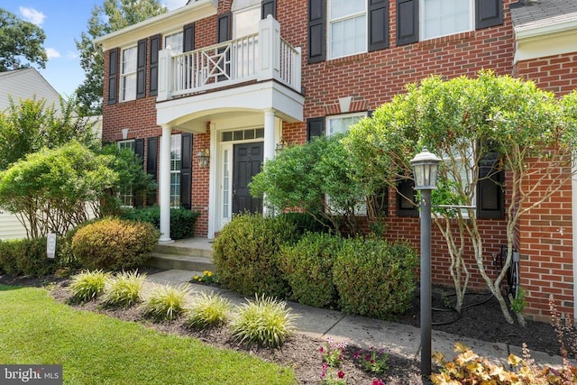 249 Whitworth Dr, Culpeper, VA 22701 - property entrance with a balcony and brick siding