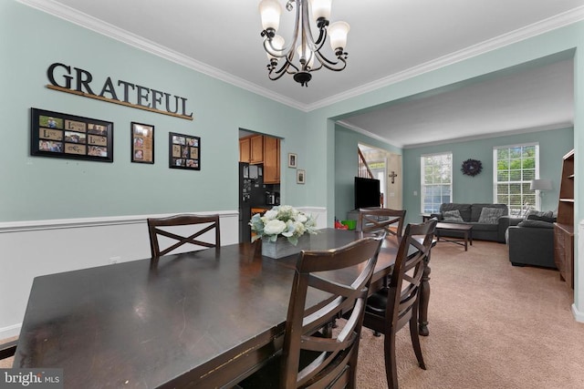 249 Whitworth Dr, Culpeper, VA 22701 - dining space featuring a chandelier, crown molding, and light colored carpet