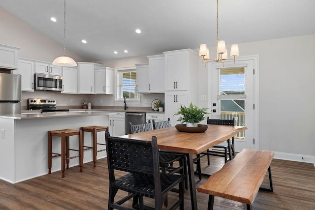 170 Lindburgh Dr, Waynesboro, VA 22980 - dining space with a chandelier, dark wood-style floors, recessed lighting, and vaulted ceiling