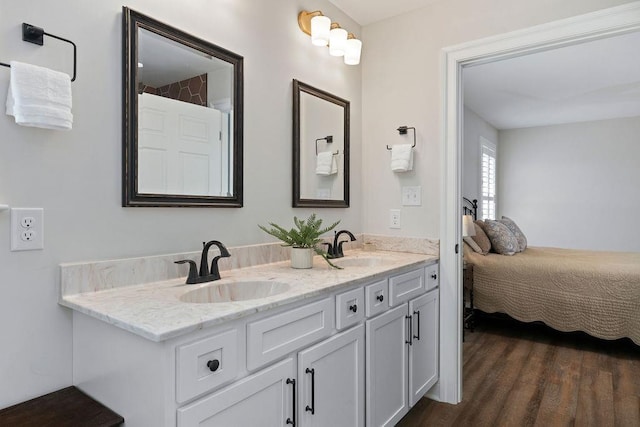 170 Lindburgh Dr, Waynesboro, VA 22980 - full bathroom featuring double vanity, connected bathroom, and wood finished floors