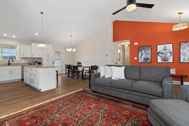 170 Lindburgh Dr, Waynesboro, VA 22980 - living room featuring a chandelier, ceiling fan, dark wood-style floors, high vaulted ceiling, and recessed lighting
