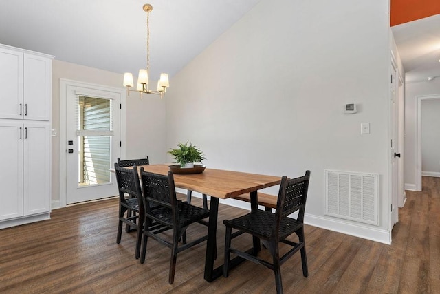 170 Lindburgh Dr, Waynesboro, VA 22980 - dining space featuring a chandelier, dark wood-style floors, and vaulted ceiling