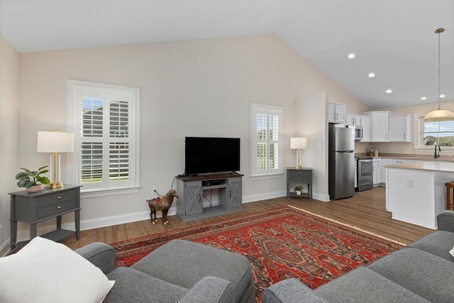 170 Lindburgh Dr, Waynesboro, VA 22980 - living room with vaulted ceiling, dark wood finished floors, and recessed lighting