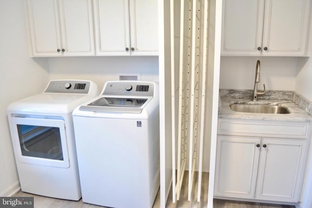 5208 Wyndemere Cir, Mineral, VA 23117 - clothes washing area with washing machine and dryer and cabinet space