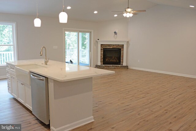 5208 Wyndemere Cir, Mineral, VA 23117 - kitchen featuring stainless steel dishwasher, open floor plan, light wood finished floors, healthy amount of natural light, and recessed lighting