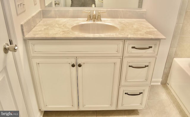 5208 Wyndemere Cir, Mineral, VA 23117 - full bath featuring tile patterned flooring, vanity, and a tub