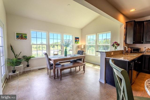 2045 Magnolia Cir, Culpeper, VA 22701 - dining area with baseboards, vaulted ceiling, and recessed lighting