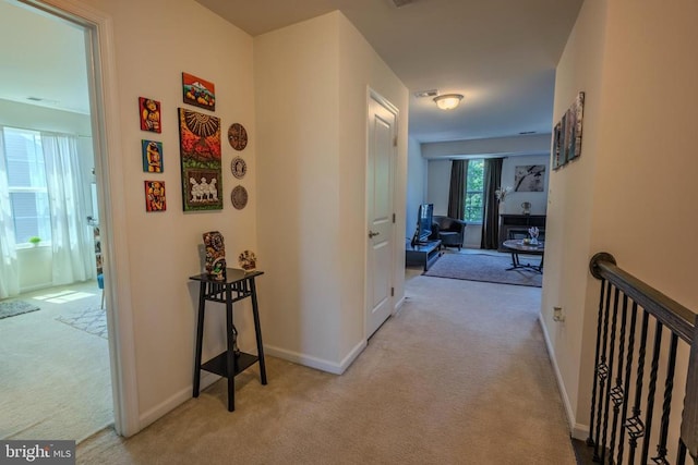 2045 Magnolia Cir, Culpeper, VA 22701 - corridor with carpet floors, baseboards, and an upstairs landing