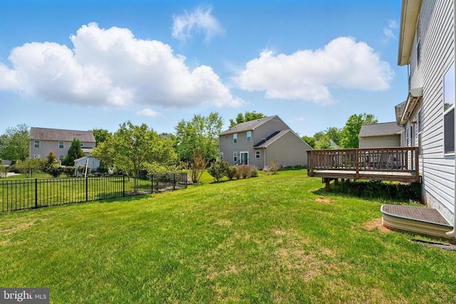 view of yard featuring a wooden deck