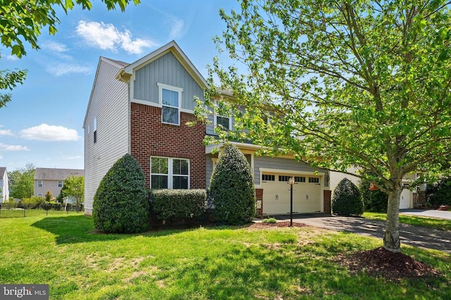 traditional home with board and batten siding, driveway, brick siding, and a garage