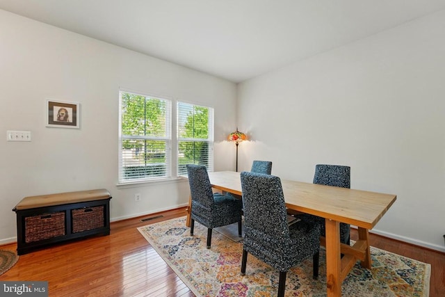 office area featuring wood finished floors and baseboards