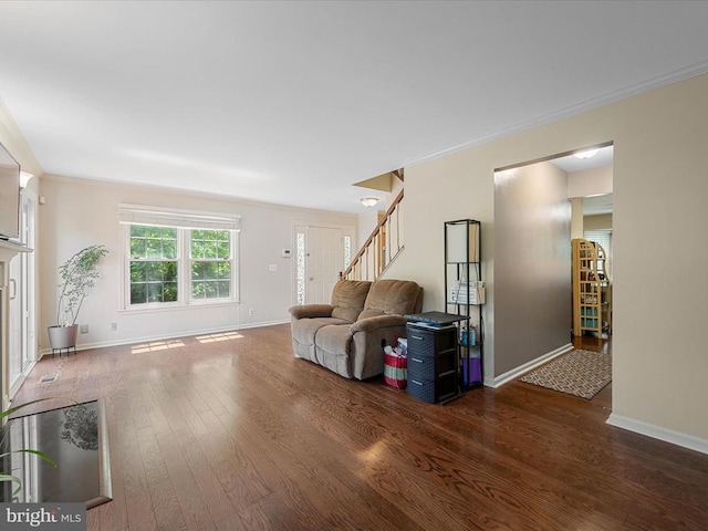 33 Pepper Tree Ct, Warrenton, VA 20186 - living room featuring wood finished floors, stairs, and crown molding
