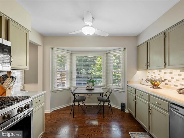 33 Pepper Tree Ct, Warrenton, VA 20186 - kitchen with appliances with stainless steel finishes, decorative backsplash, light countertops, dark wood-type flooring, and gray cabinets