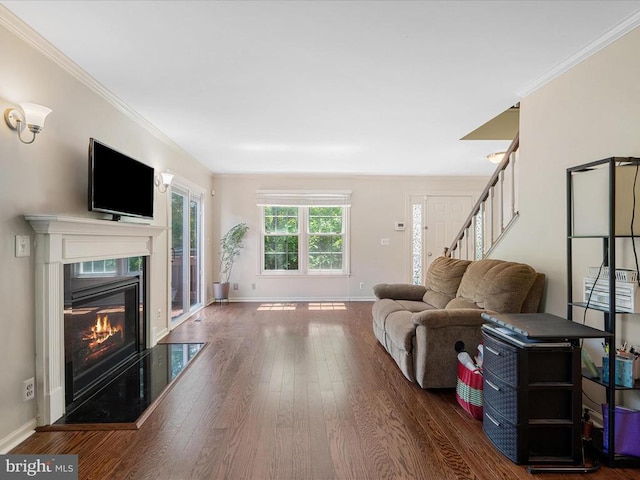 33 Pepper Tree Ct, Warrenton, VA 20186 - living area with wood finished floors, a fireplace, stairway, and crown molding