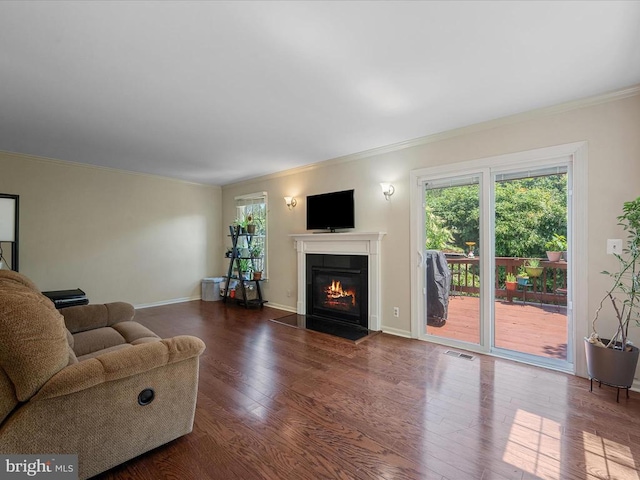 33 Pepper Tree Ct, Warrenton, VA 20186 - living room with crown molding, wood finished floors, and a fireplace with flush hearth