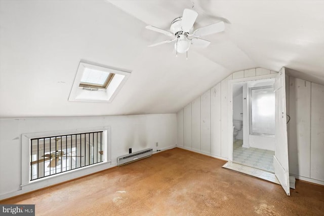 2188 Seville Rd, Madison, VA 22727 - additional living space featuring a baseboard heating unit, vaulted ceiling, a skylight, carpet floors, and ceiling fan